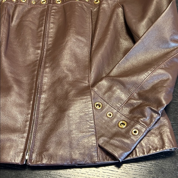 Fabulous St.John Butter Soft Leather
Jacket Embellished w/Brass
Grommets - Picture 11 of 17